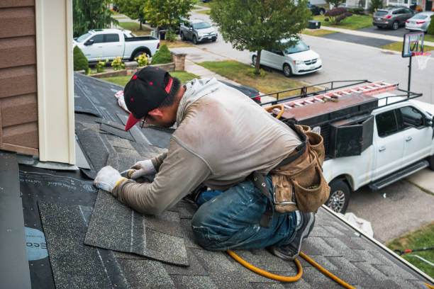 Professional Storm Damage Roof Repair technician working in Northville, NY